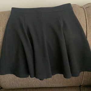 96% polyester & 4% spandex. Stretchy and comfortable. Size S.